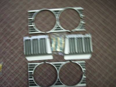 GM Restoration Parts - 1969 CHEVY PASSENGER HEADLIGHT BEZELS WITH EXTENSIONS - NOS