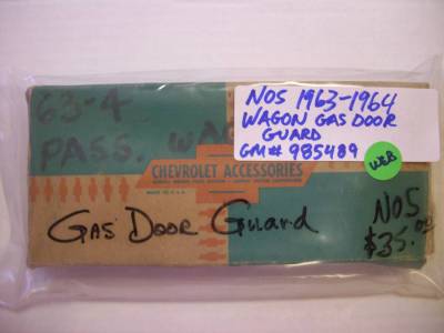1963-64 CHEVY PASSENGER WAGON GAS DOOR GUARD - NOS