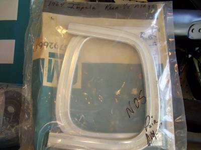 1964 CHEVY PASSENGER IMPALA REAR COVE MLDGS - NOS