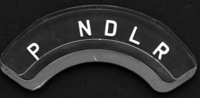 TRANSMISSION INDICATOR LENS